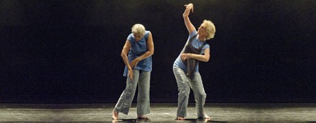 two older women dancing on stage