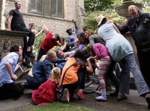 A group of people huddling together