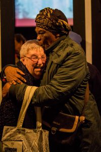 Two women hugging