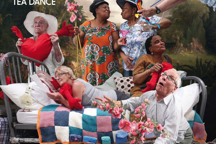 6 people in costumes posing around a bed.