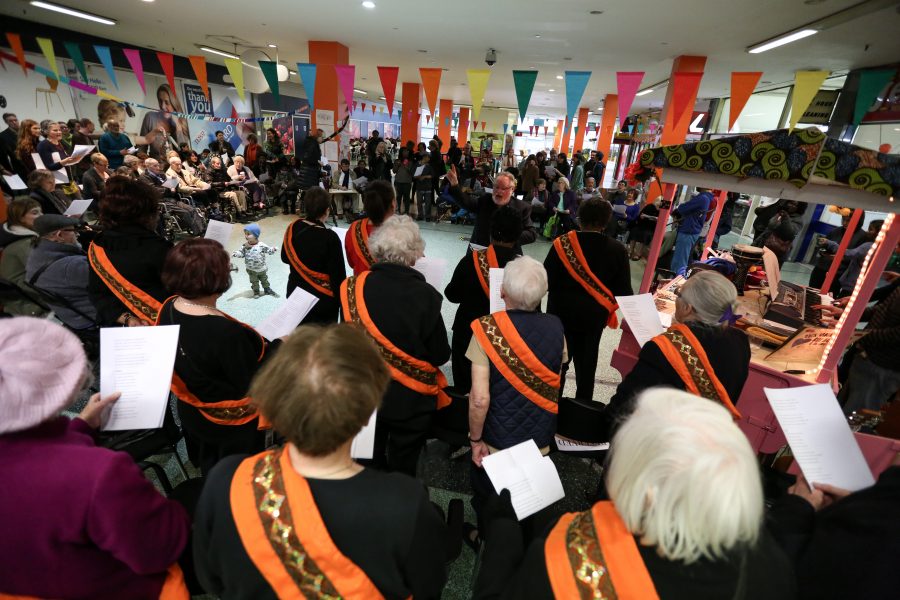 bunting and many people with sashes