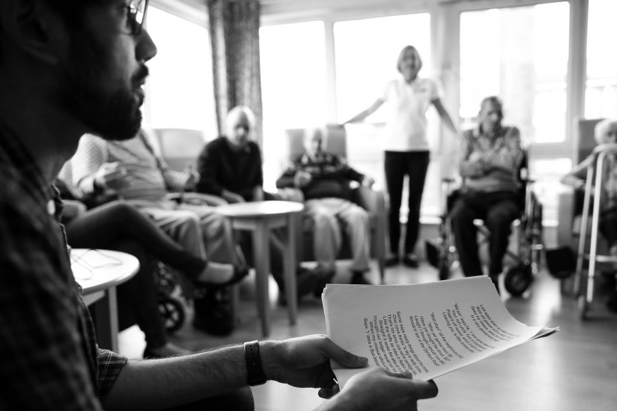 people sitting in care home