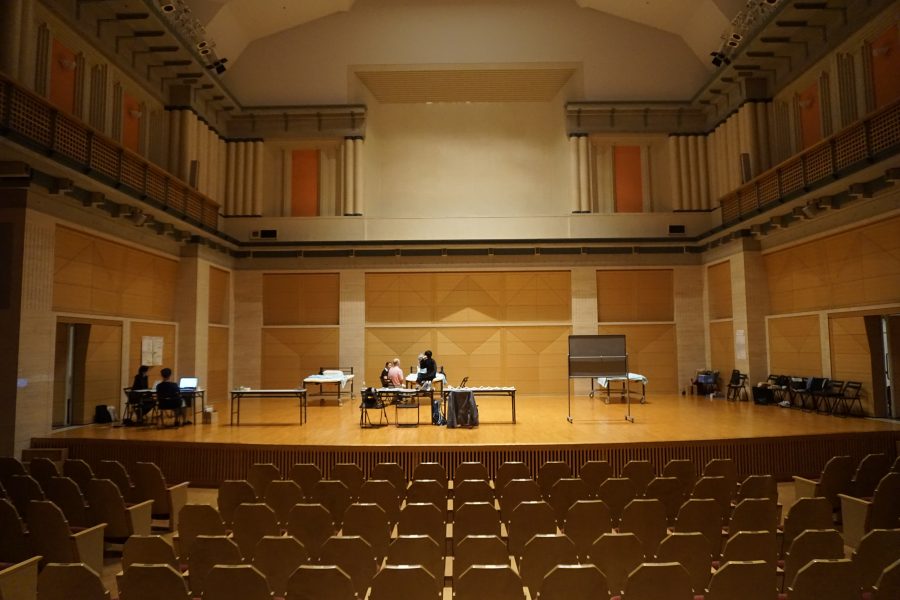 bed on a stage in a theatre