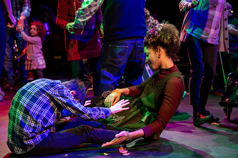 woman with participant movinga round on the floor