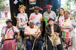 group of older people smiling at the camera