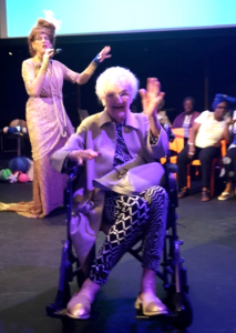 woman in wheelchair at arts event