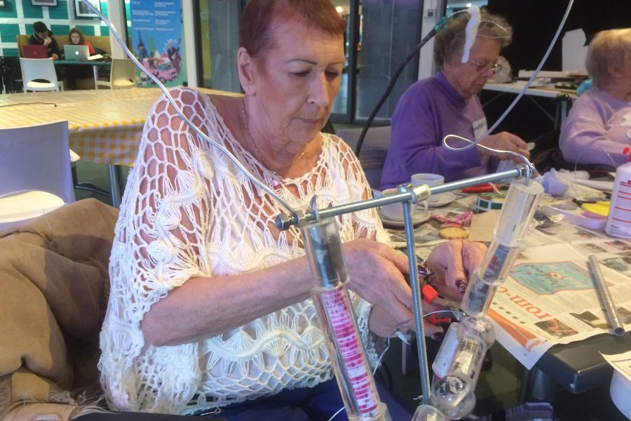 woman making a sculpture at a workshop