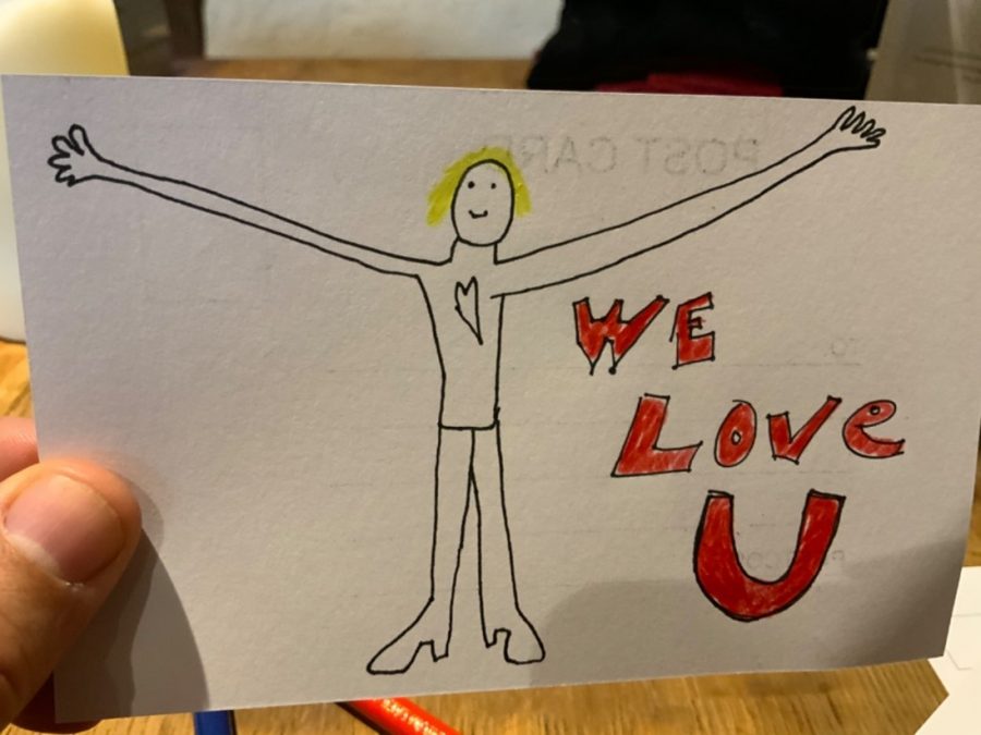 drawing of person with long arms with text saying I love You