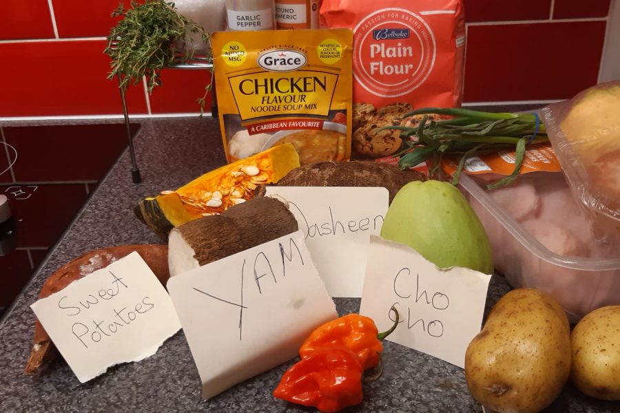 packets and vegetables on a kitchen worktop