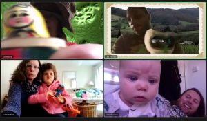 a screen shot of a zoom call between artists and participants. A man with a green landscape background, two women hugging, a baby and a man.