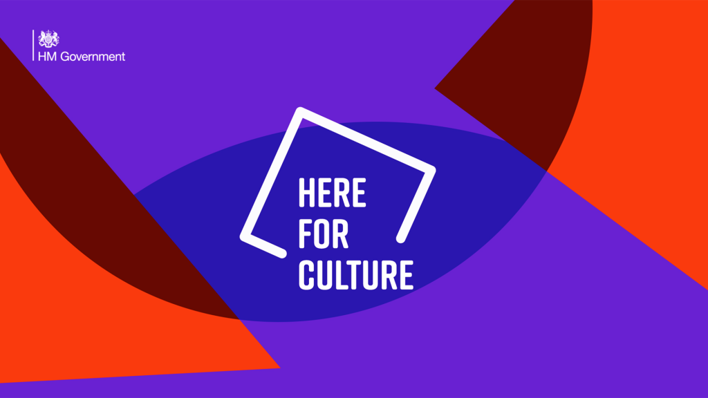 graphic image in red and purple with text Here for Culture ina white square outline.